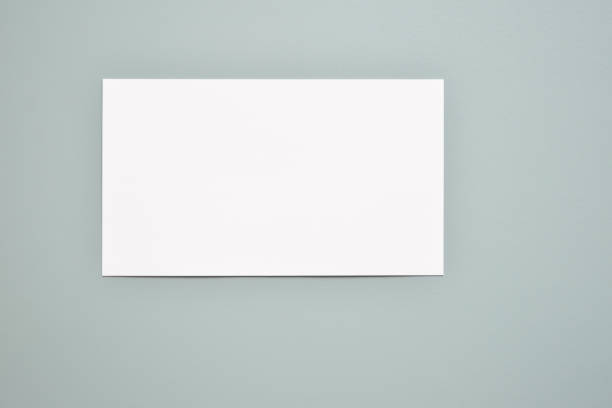 istock paper white on green  color background, space of text 1183300365