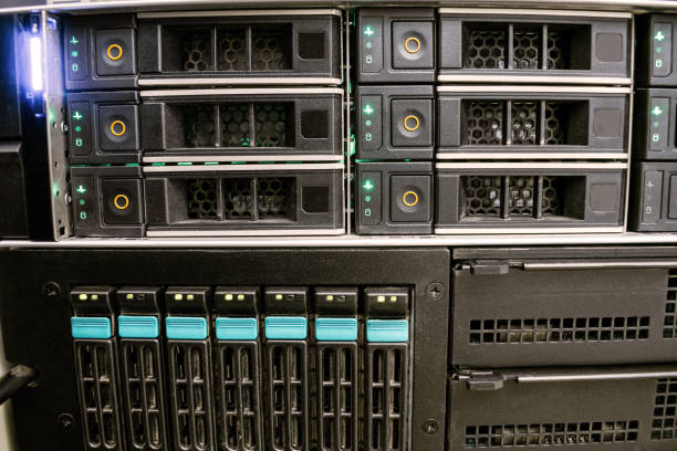 istock Front panel of multifunctional computer equipment. The database server is in the rack of the data center. Modern computer equipment is installed in the server room 1183302098