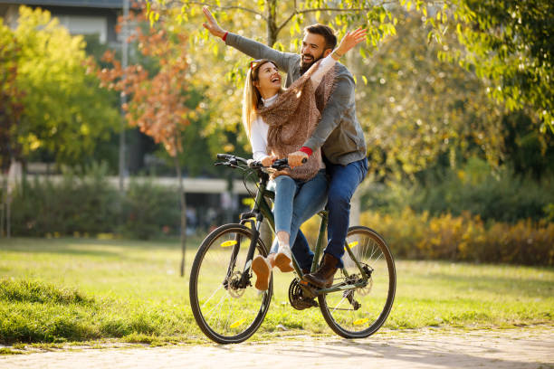 istock Couple enjoying a bicycle ride in the city 1183302721