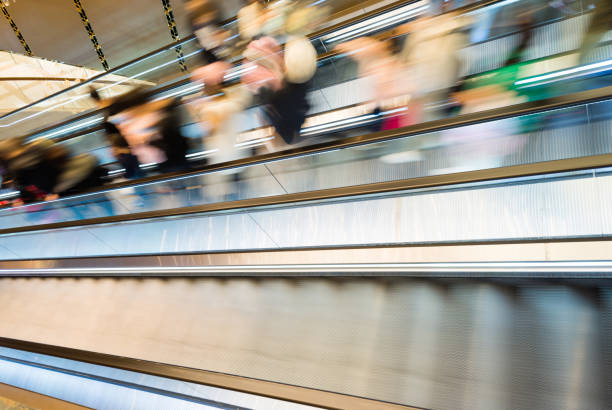 A group of people on escalator