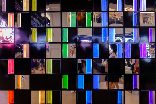 colorful glass and mirror reflection facade wall