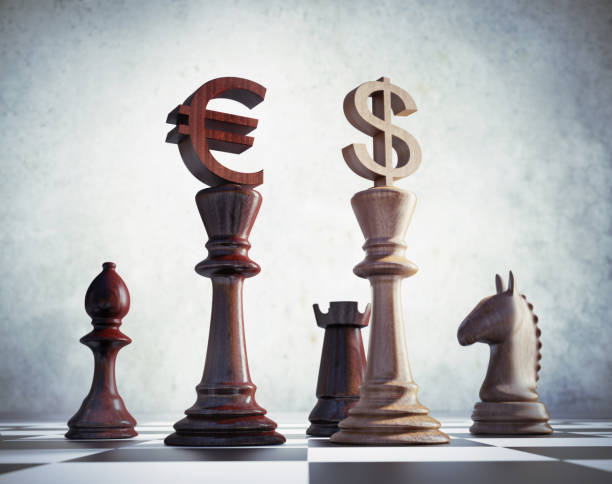 istock Chess Pieces with Dollar and Euro Symbols - 3D illustration 1183307831