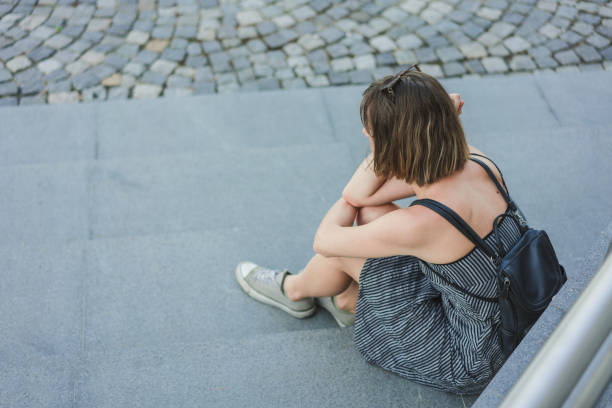istock Young depressed woman 1183307835