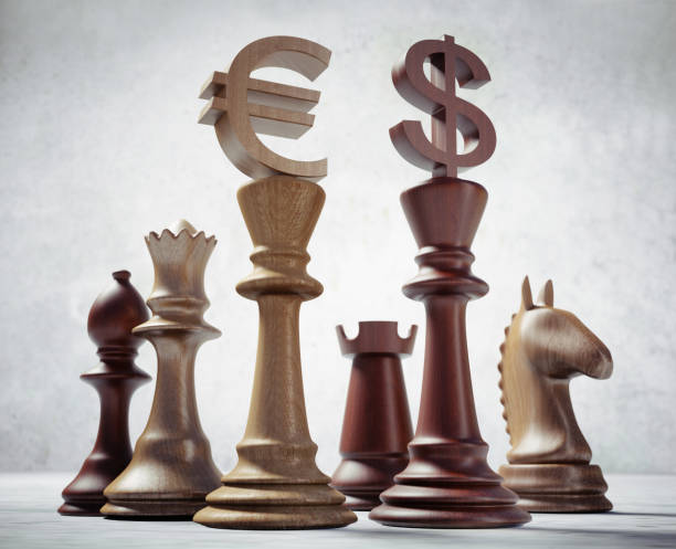 istock Chess Pieces with Dollar and Euro Symbols - 3D illustration 1183307844