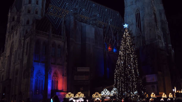 istock A Christmas tree near an ancient cathedral 1183309110