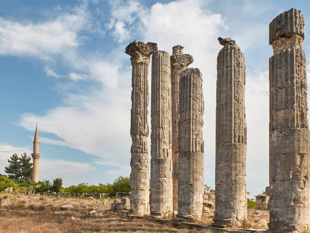 Corynthian columns of Zeus Olbios Temple, ancient Anatolian architecture of the Hellenistic period Corynthian columns of Zeus Olbios Temple, ancient Anatolian architecture of the Hellenistic period in the Roman province of Isauria, in present-day Uzuncaburc, Silifke, Mersin province, Turkey uzuncaburc stock pictures, royalty-free photos & images