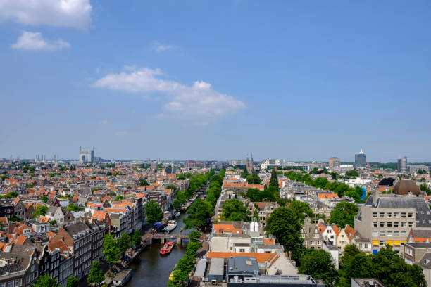 istock Panoramic view over springtime Amsterdam with the famous canals 1183313935