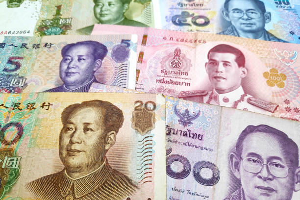 istock Stack of Chinese Renminbi & Thai Baht 1183316439