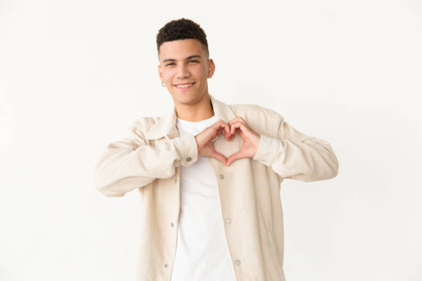 istock Content man showing hand heart symbol 1183316762