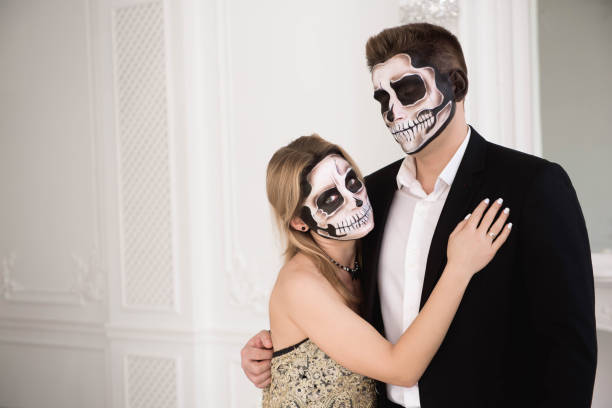 istock A couple with skeleton make up for Halloween or All Souls Day 1183319034