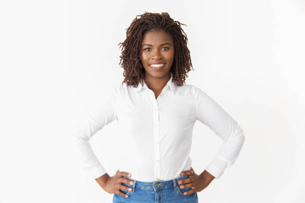 istock Happy cheerful sales agent keeping hands on hips 1183320877