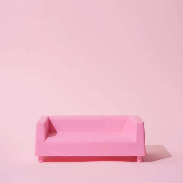 istock Pink sofa in pink room 1183320898