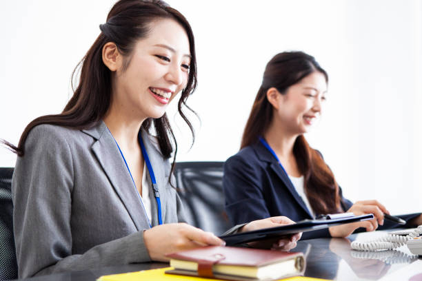 istock two women who is working in ther office 1183321888