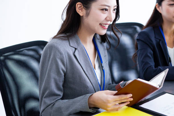 two women who is working in ther office