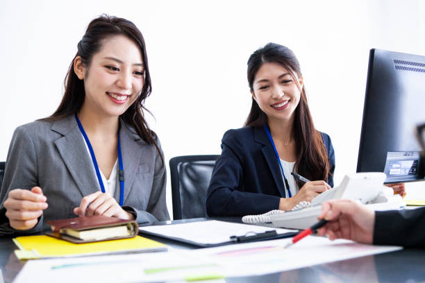 istock two women who is working in ther office 1183321898