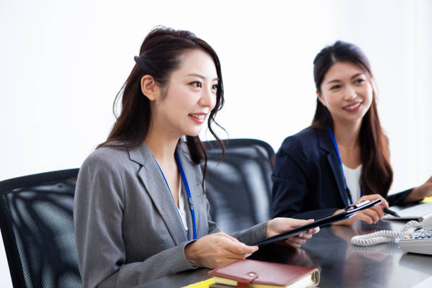 istock two women who is working in ther office 1183321903