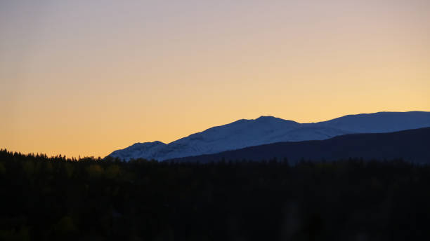 mountains over Oppdal Sunset in the mountains over Oppdal, Norway oppdal stock pictures, royalty-free photos & images
