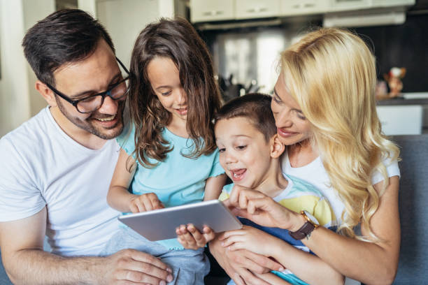 istock Family with digital tablet 1183323466