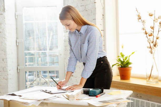istock Interior designer working with colour palette in modern office 1183323977