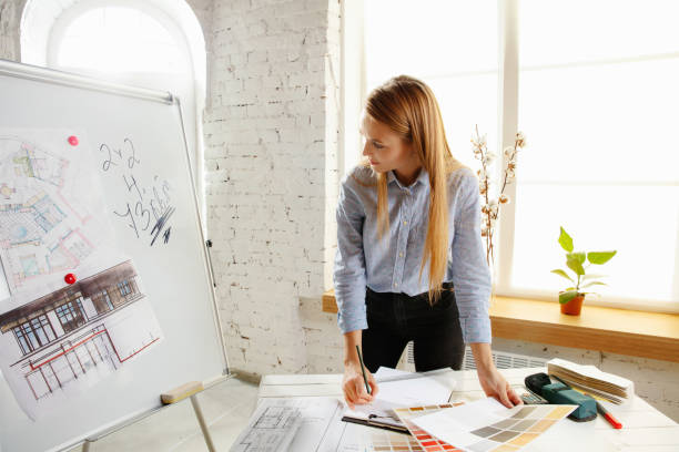 istock Interior designer working with colour palette in modern office 1183323978