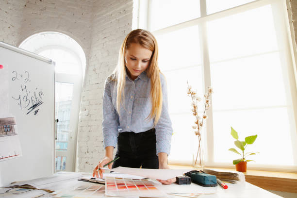 istock Interior designer working with colour palette in modern office 1183323984