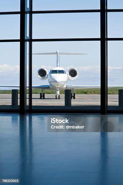 Private Corporate Jet At An Airport Terminal Stock Photo - Download Image Now - Corporate Jet, Air Vehicle, Airplane