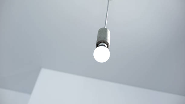 istock Light bulb hanging from ceiling, energy saving and energy efficiency, service 1183329277