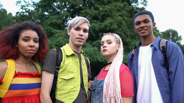 istock Self-confident group of millennials looking camera standing outdoors, freedom 1183329964