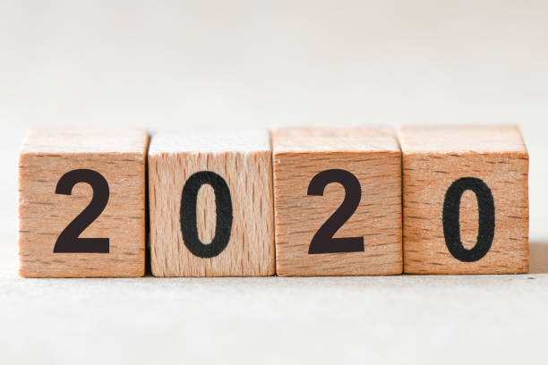 istock 2020. Wooden cube block building the word 2020. 1183331274