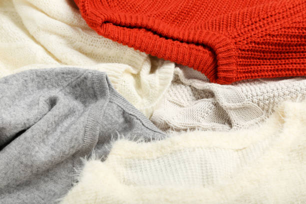 istock Background of colorful knitted sweaters 1183334095