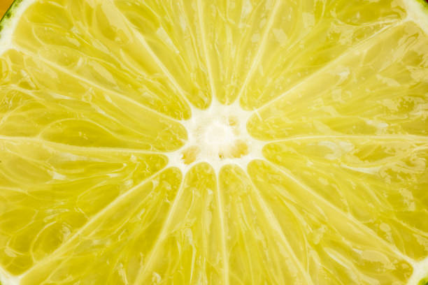 istock Background and texture of a slice of citrus lime pulp 1183334659