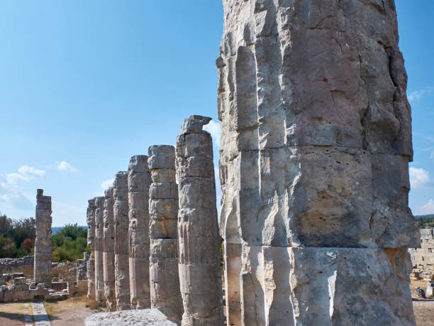 Corynthian columns of Zeus Olbios Temple, ancient Anatolian architecture of the Hellenistic period Corynthian columns of Zeus Olbios Temple, ancient Anatolian architecture of the Hellenistic period in the Roman province of Isauria, in present-day Uzuncaburc, Silifke, Mersin province, Turkey uzuncaburc stock pictures, royalty-free photos & images
