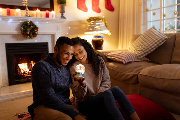 Couple at home at Christmas time