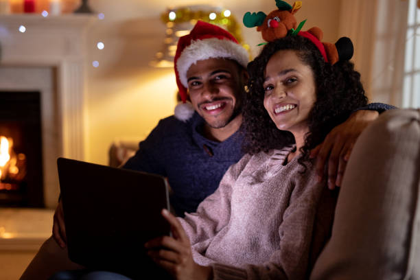istock Couple at home at Christmas time 1183337484