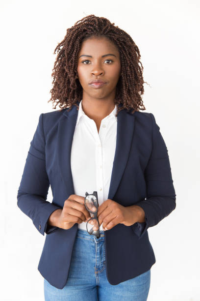 istock Serious consultant holding glasses 1183337498