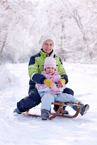 istock Family winter fun time 1183338401