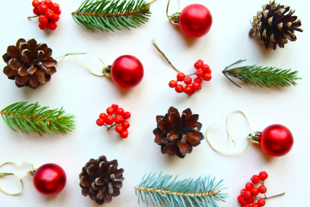 istock Christmas pattern with cones, red baubles and spruce branches 1183338709