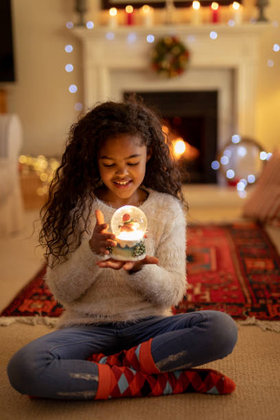 istock Girl at home at Christmas time 1183338977
