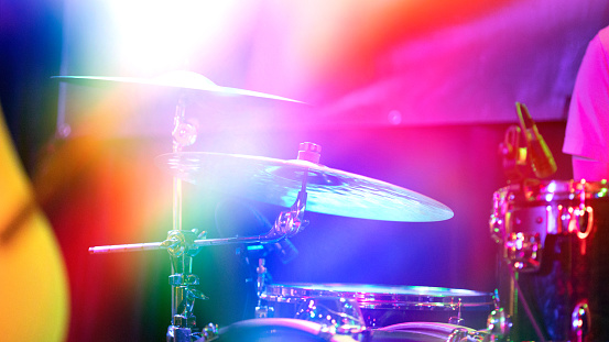 Colorful stage light on the drums