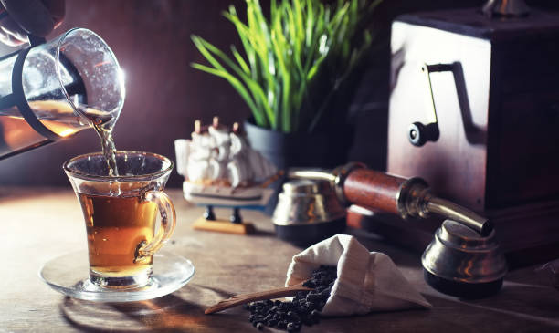 istock Brewing tea on a wooden table 1183340479