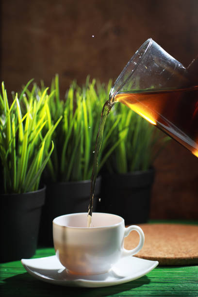 istock Brewing tea on a wooden table 1183341095