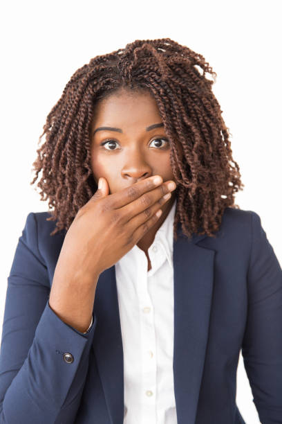 istock Shocked office employee covering mouth with hand 1183341225