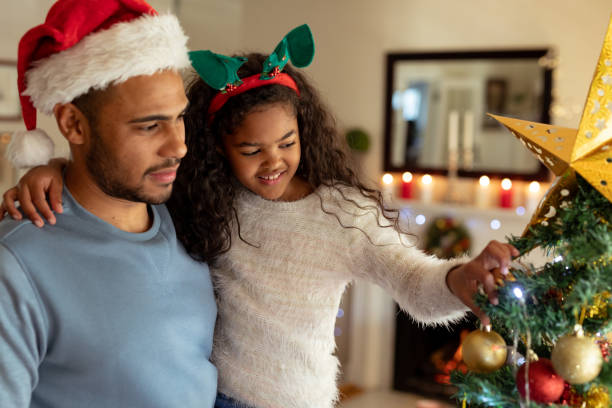 istock Family at home at Christmas time 1183341532