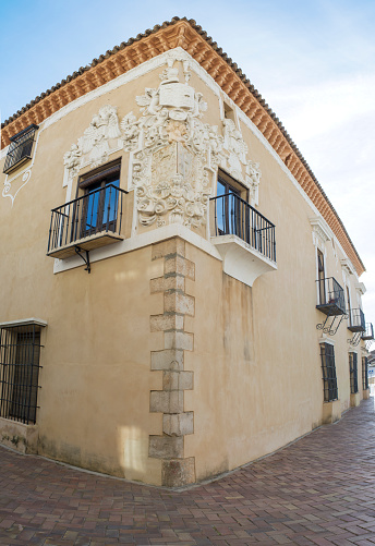 Almendralejo, Spain. January 26th, 2018: Town Hall Building former Palace of Monsalud, Almendralejo, Badajoz, Spain. Corner Balcony