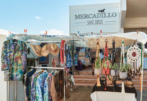 hippy market of sant Jordi, Ibiza, Balearics, spain Ibiza, Baleares, Spain, October 5, 2019. People walking and shopping at the street stalls of the hippy Market of Sant Jordi, the most bohemian and appreciated by the Ibizan balearics stock pictures, royalty-free photos & images