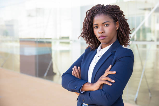 istock Serious successful professional posing near office building 1183345413