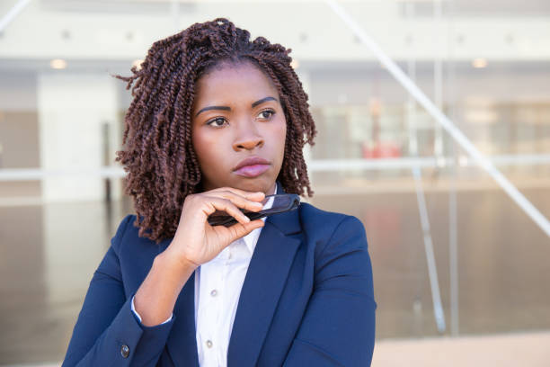 istock Pensive office employee thinking outside 1183347606