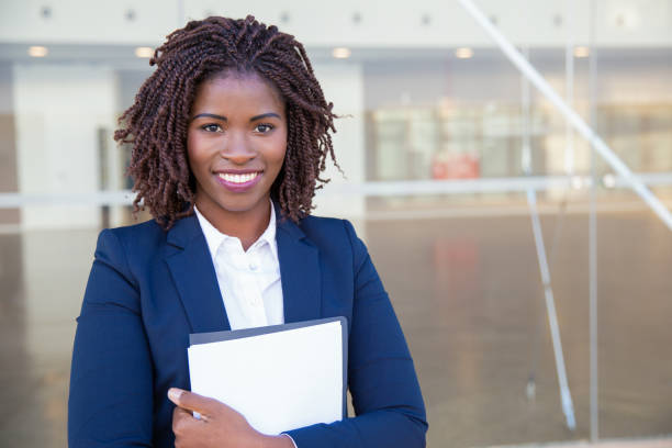 istock Happy friendly legal expert posing outside 1183347767