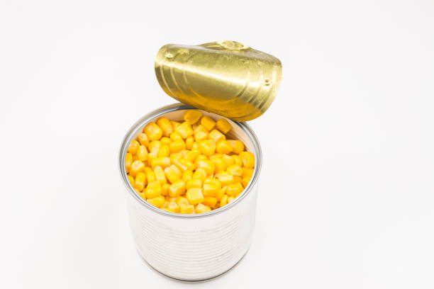 istock Canned food on white background. Sweet corn. 1183347870