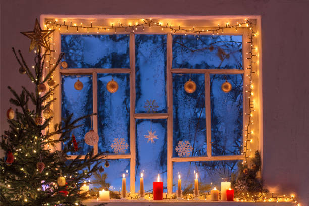 istock Christmas decorations on old wooden window 1183350444